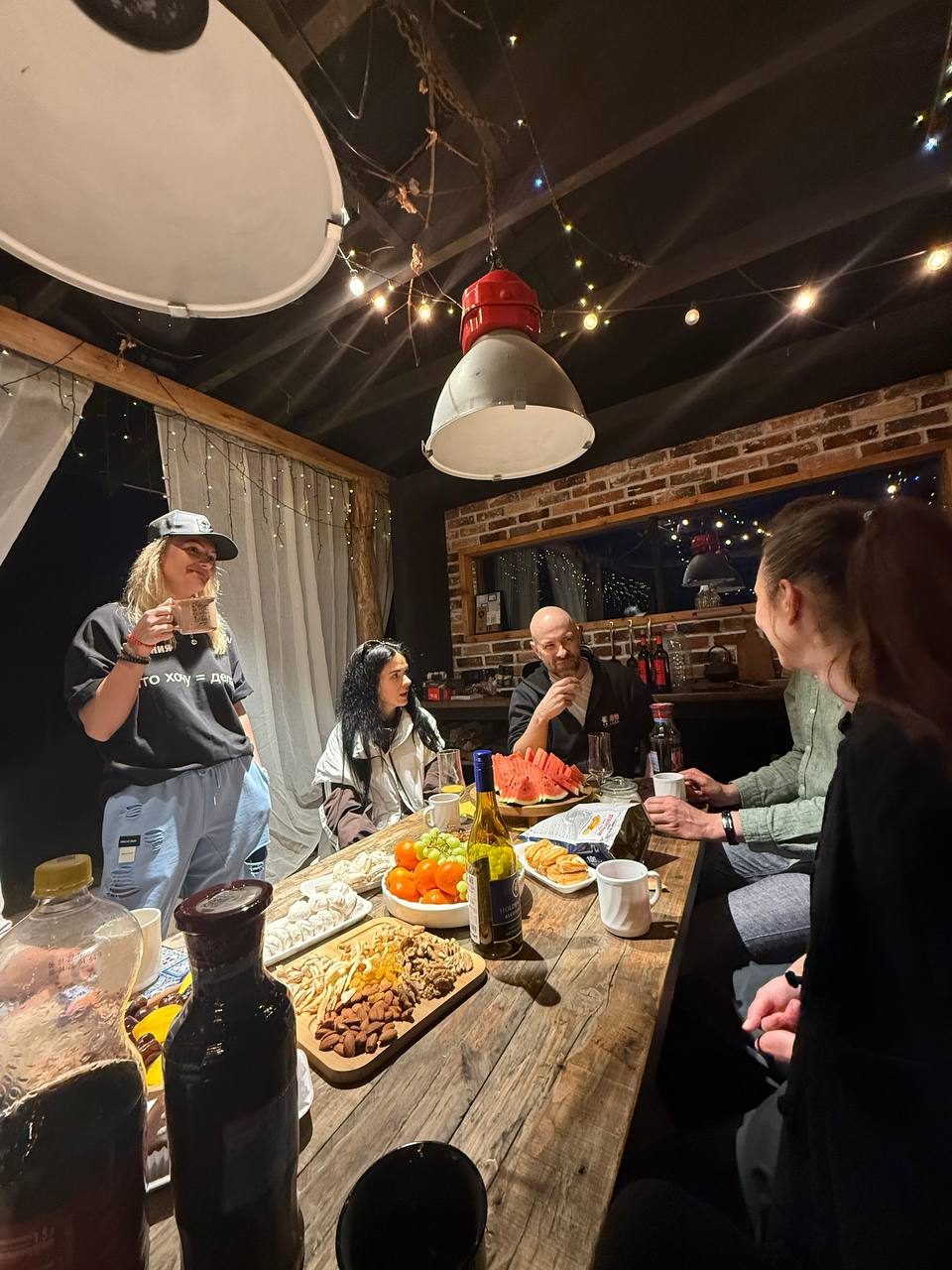 AELITA COMMUNITY members having dinner together